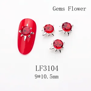 Macro view of red sun flower nail crystal with silver claw setting, size 9x10.5mm