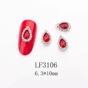 Macro view of LF3106 6.3x10mm red teardrop crystal nail art gems with silver base