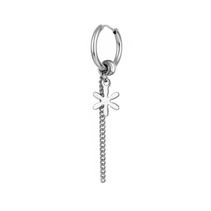 Detailed macro view of silver titanium steel hoop earring with floral pendant and long chain tassel