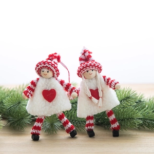Handmade wool felt Christmas angel dolls with knit hats for festive tree decoration