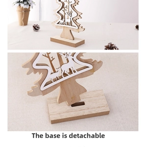 Detail of a carved wooden Christmas tree featuring a detachable base and reindeer pattern