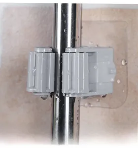 Waterproof wall-mounted mop holder with non-slip rollers and transparent adhesive base