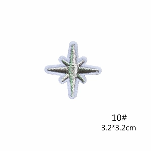 Detailed macro view of 10# astronaut universe planet embroidery patch with size details