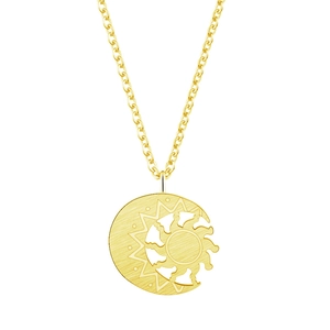 Macro view of golden sun and crescent moon pendant on a minimalist stainless steel chain