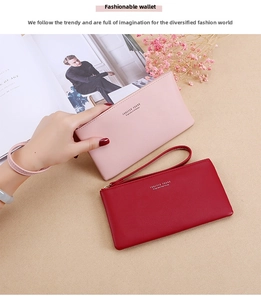 Detail of elegant long women's wallet showing lychee grain PU leather texture and zip