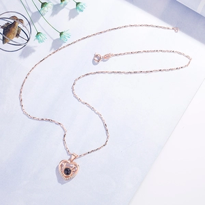 Roségoldene Herzkette mit Hirschgeweih und Projektionsstein für 100 Sprachen Ich liebe dich
