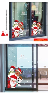Detail of Christmas window stickers featuring Santa, snowman, and white snowflakes