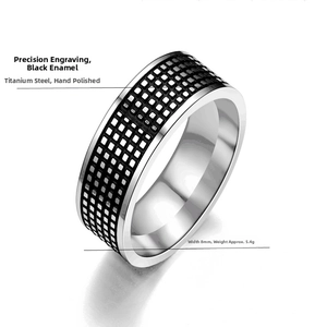 Detail view of 8mm titanium steel ring featuring carved oil-filled geometric patterns