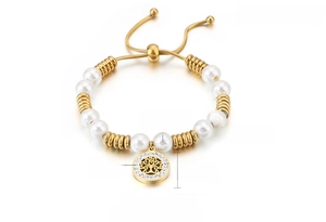 Detail of adjustable stainless steel bracelet with shell pearls and life tree charm