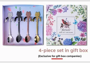 Set of four stainless steel cat-shaped coffee spoons in a floral bird gift box