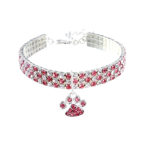 Sparkling pink and white rhinestone pet collar with a cute paw print pendant on silver metal