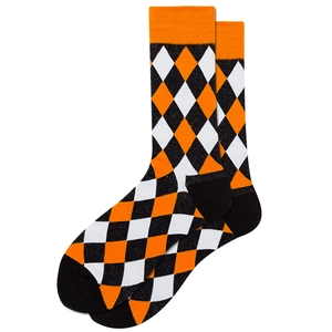 Detail of adult mid-calf socks with classic orange, black and white argyle pattern