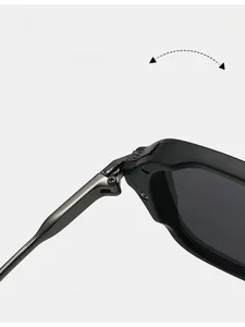 Detail of durable texture hinge on matte black metal frame oversized sunglasses