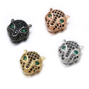 Detail of leopard head jewelry beads with micro-pave crystals in four metallic finishes