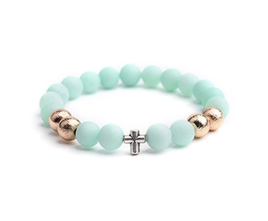 Close-up of mint green matte beaded bracelet with rose gold beads and silver cross charm