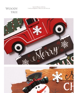 Detailed view of wood texture and snowman illustration on Christmas truck hanging ornament