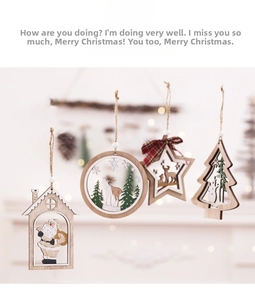 Close-up of wooden hollow Christmas ornaments with tree and reindeer motifs