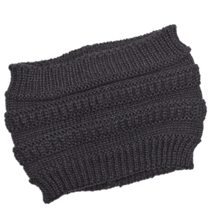 Close-up of the black chunky knit headband featuring a detailed wave texture pattern