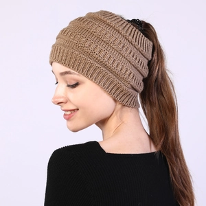 Knitted ponytail headband hat in khaki for women, featuring a top opening for hair