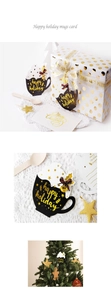 Detail of mug-shaped Christmas gift tags with gold foil Happy Holiday lettering
