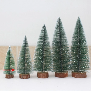 Set of 5 mini frosted Christmas trees with wooden bases in varying heights