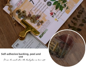 Macro shot of nature-themed PET stickers with plants and mushrooms on a vintage journal