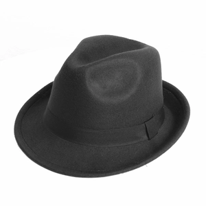 Close-up of a classic black wool fedora featuring a matching grosgrain ribbon band