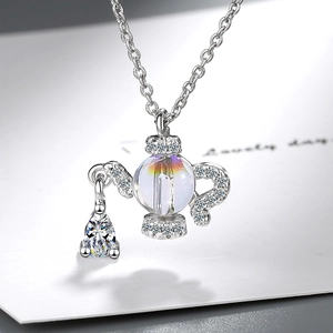 Elegant teapot crystal necklace with a water drop pendant and sparkling zircon accents