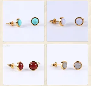 Detailed set of four gold-rimmed round stud earrings with assorted natural gemstones