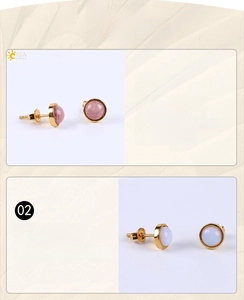 Detail of round pink and opal natural stone stud earrings with gold metal settings