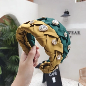 Handcrafted woven rhinestone headband set in elegant dark green and mustard yellow fabric