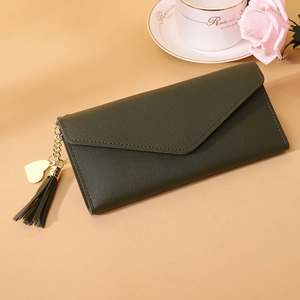 Dark green leather long wallet for women with envelope flap and heart tassel detail