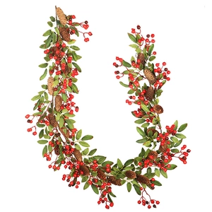 U-shaped Christmas garland with red berries, pine cones and green leaves on white background