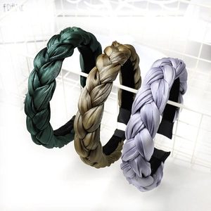 Three braided satin headbands in dark green, olive and lilac with non-slip interior