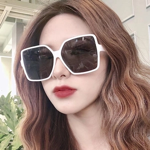 Retro oversized square sunglasses with bold white frames and dark gray lenses for women