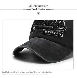 Detail display of black washed cotton baseball cap with 3D Always embroidery and sturdy brim