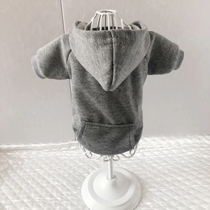 Detail of grey cotton fleece pet hoodie with kangaroo pocket and ribbed cuffs