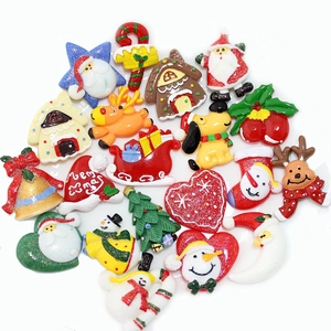 Mix of colorful resin Christmas charms including Santa, Reindeer and trees for DIY crafts