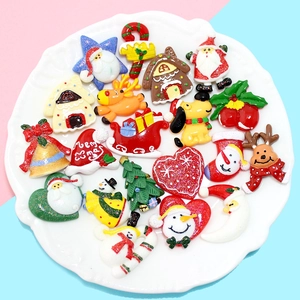 Assorted Christmas resin accessories including Santa and Reindeer for DIY crafts