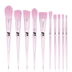 Close-up of 10-piece pink makeup brush set with metallic handles and soft synthetic bristles