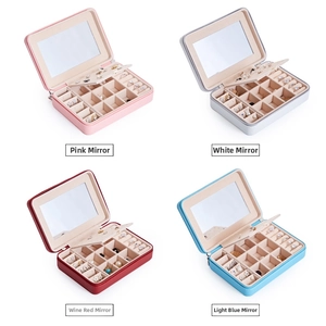 Portable jewelry storage box in pink white burgundy and light blue with built-in mirror