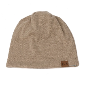 Detailed waffle knit texture on khaki beanie with F&S brown leather brand patch