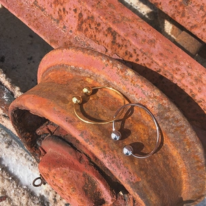 French vintage elegant solid ball open bangles in polished gold and silver finishes