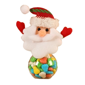 Mini Christmas Santa Claus candy jar with transparent container and plush red hat topper
