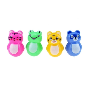 Set of four colorful cartoon animal tumbler toys including tiger, frog, and panda