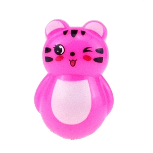 Close-up of pink cat squeeze toy with cute facial expression and soft texture