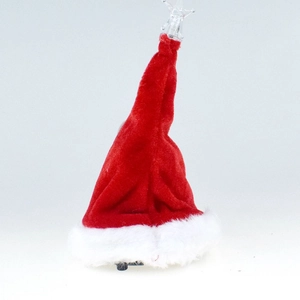 Detail of red plush Christmas hat with glowing star top and electric base