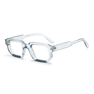 Detail view of transparent light blue thick square frame glasses with metal hinges