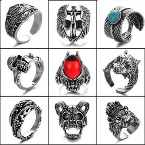 Detailed grid of vintage silver punk rings featuring skull, lion head, and wing motifs