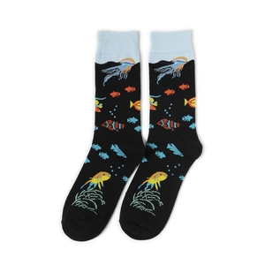 Close-up of black mid-calf socks with colorful jellyfish and coral knit patterns
